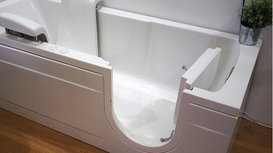 Walk-in tub with the door open, showing the low step-over entry